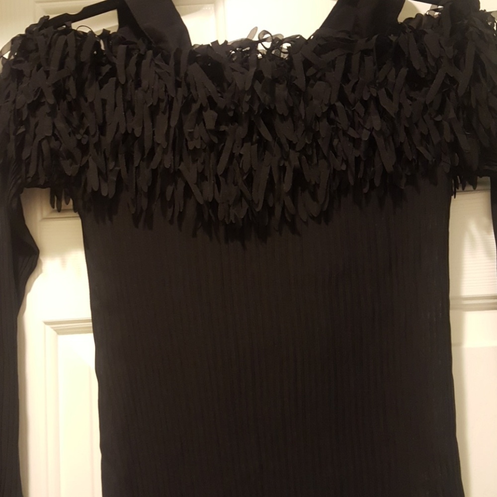 Like new a sexy black off the shoulder top
